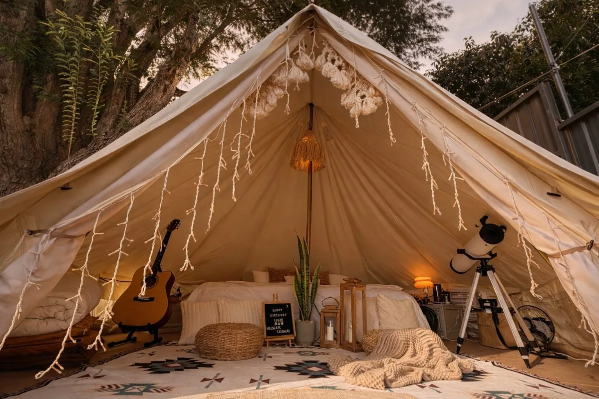 Camp 3 with guitar, telescope and fairy lights